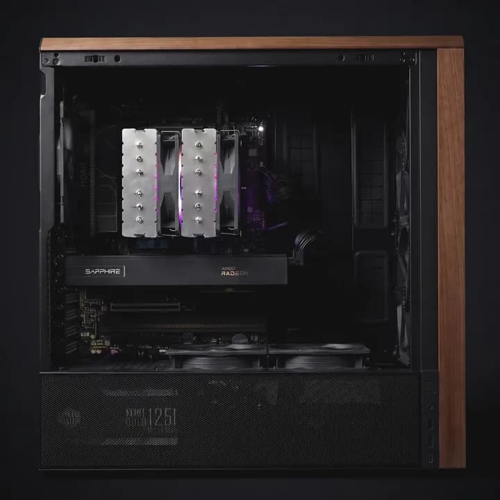 A Desk AI PC with an AMD Radeon AI PRO R9700, built in our Pune workshop: a black tower with wooden trim and its side open